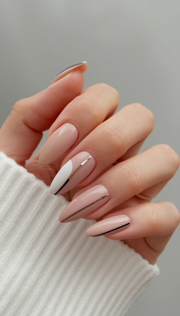 Single line accent nail design with a minimalist nude base and thin line detail, creating a clean, modern, and elegant manicure look