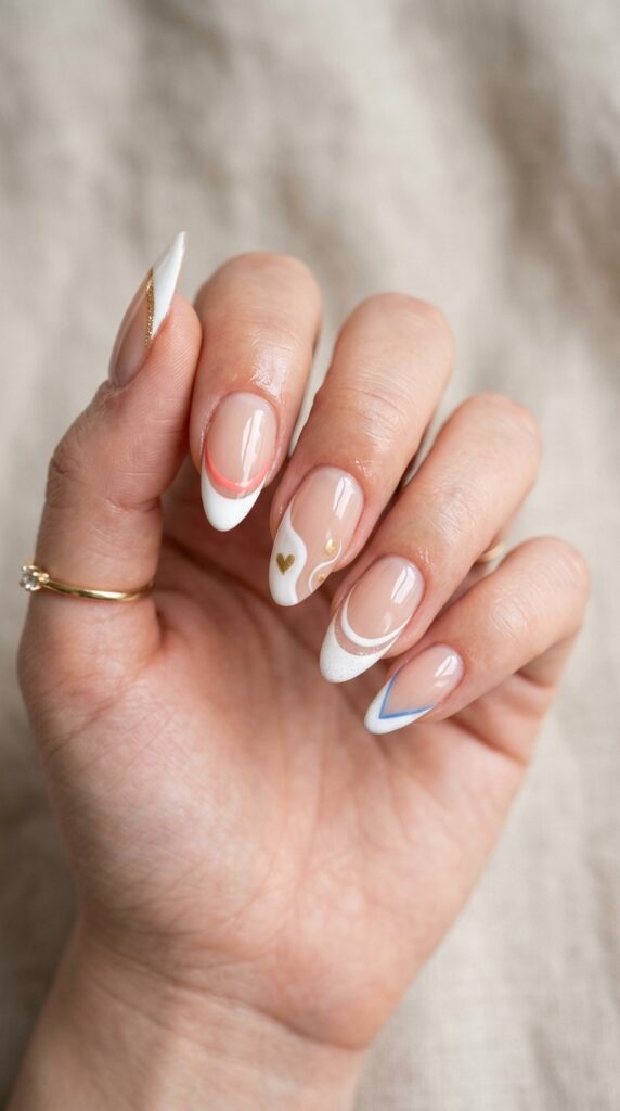 French tip nails with a creative twist featuring modern shapes and accents, creating a trendy, elegant, and updated manicure with a chic aesthetic